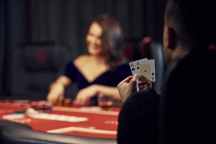 sortoto slot app interface on mobile phone, showing live roulette table with player betting area and chat